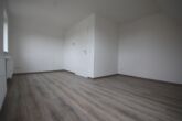 Wohnzimmer - Gemütliche Dachgeschosswohnung in Adersheim
