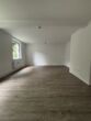 Wohnzimmer - Sanierte 4-Zimmerwohnung im Erdgeschoss!