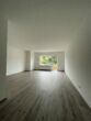 Wohnzimmer - Sanierte 3-Zimmerwohnung mit Sonnenbalkon